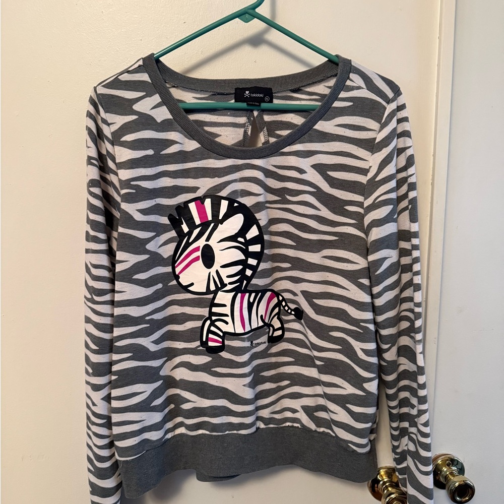 Tokidoki Gray Zebra Print open back sweatshirt.